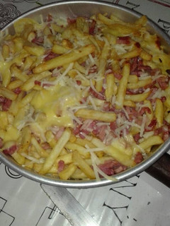 Una foto de Patatas con beicon y queso al horno