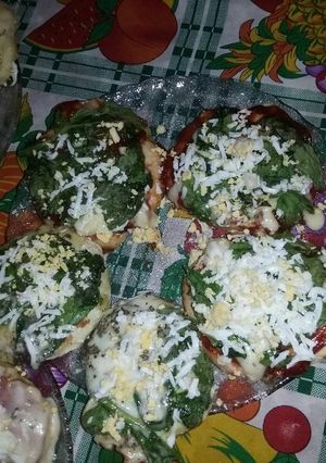 Una foto de Pizzetas de rucula