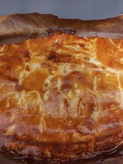 Una foto de Empanada de pulpo, mejillones y gambas