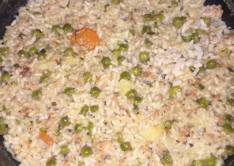 Arroz en caldo de cordero al horno