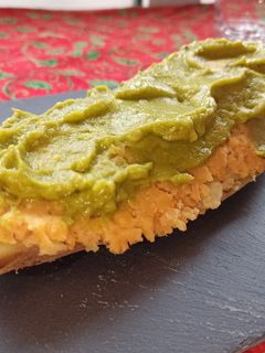 Una foto de Boniato relleno de lenteja roja