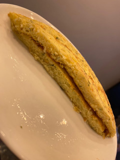 Una foto de Tortilla de papa rallada