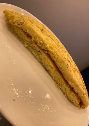 Una foto de Tortilla de papa rallada