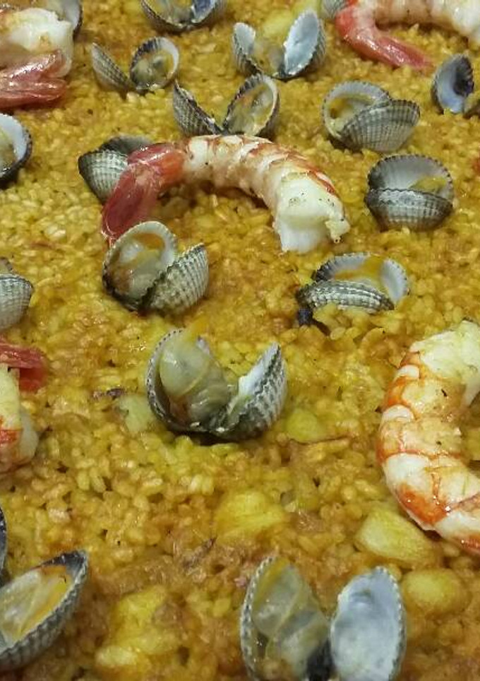Una foto de Arroz a banda