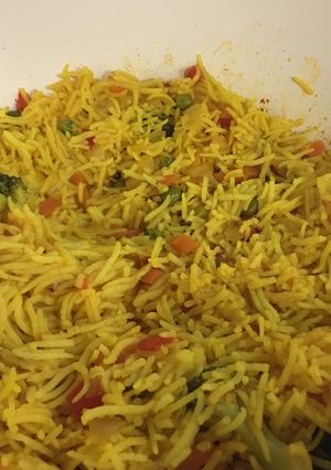 A picture of Rice with veggies.