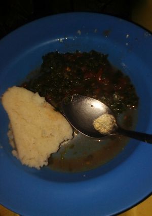 A picture of Ugali and kienyeji vegetables.
