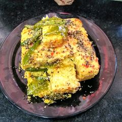 A picture of Dhokla With Pizza Twist.