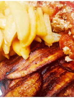 A picture of Fried Irish Potatoes, Plantain and Egg Souce.