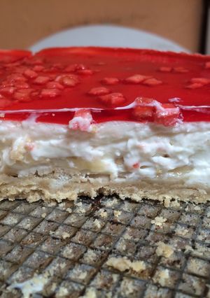 Una foto de Cheesecake de plátano y frutos rojos
