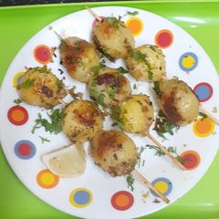 A picture of Farali Grilled Potatoes with Sesame seeds.