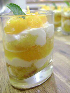 Una foto de Tiramisú de naranja en vasito