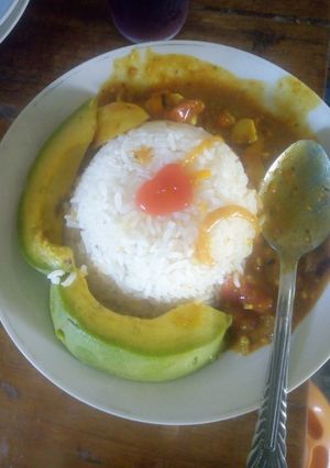 A picture of Creamy Egg Curry and milk Rice.