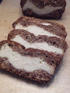 A picture of Banana Bread with Cheesecake Filling.