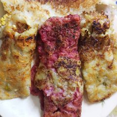 A picture of Veggies stuffed Cheela roll.