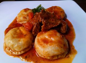 Una foto de Sorrentinos de Calabaza y Muzarella
