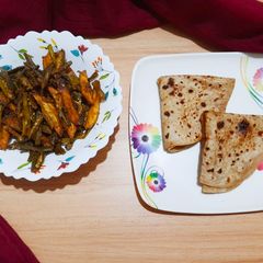 A picture of Chapati with finger fries masala bhindi.