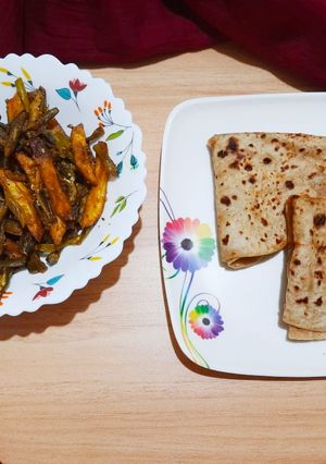 A picture of Chapati with finger fries masala bhindi.