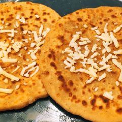 A picture of Stuffed Aloo Cheese Paratha 🧀🥔.