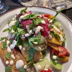 A picture of Crispy Tofu Shawarma with Pickled Onions.