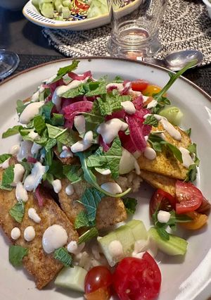 A picture of Crispy Tofu Shawarma with Pickled Onions.