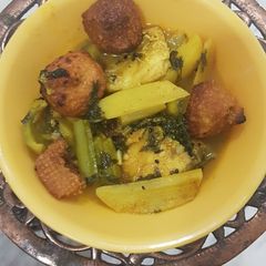 Bengali fish curry (Maacher Jhol with veggies and Bori) A picture of Bengali fish curry (Maacher Jhol with veggies and Bori).