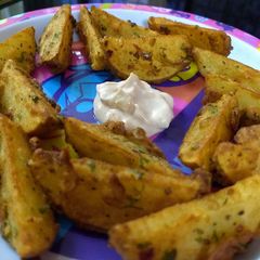 A picture of Potato wedges.