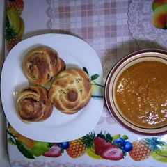 A picture of Chocolate milk dinner rolls with pumpkin soup# kids challenge.
