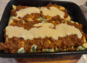 Una foto de Canelones de ricota, espinaca y nuez