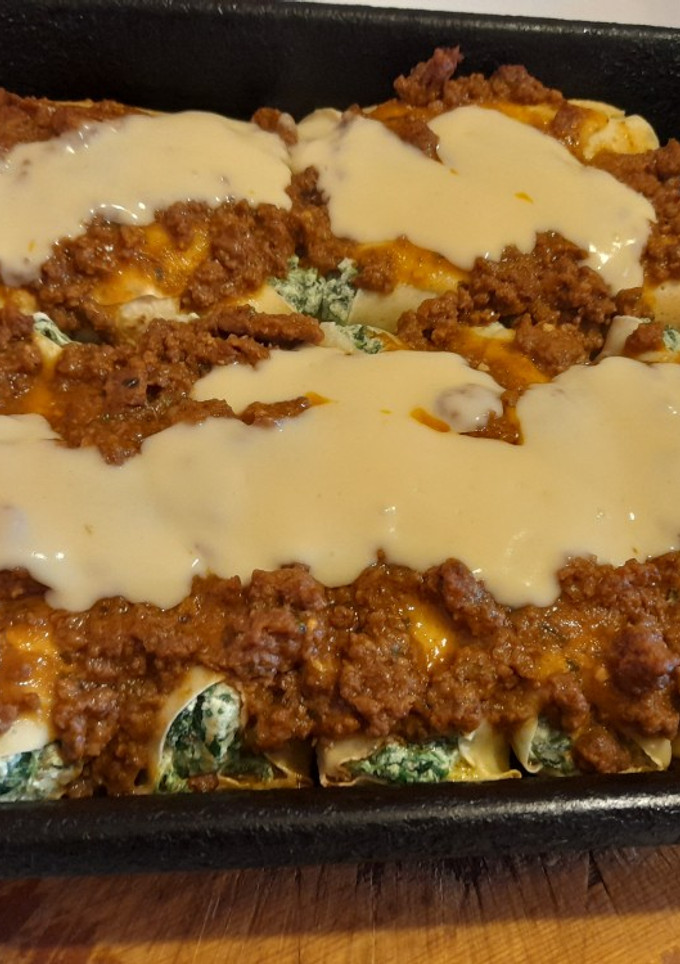 Una foto de Canelones de ricota, espinaca y nuez