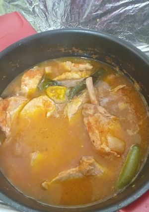 Una foto de Chuleta con hueso en salsa roja