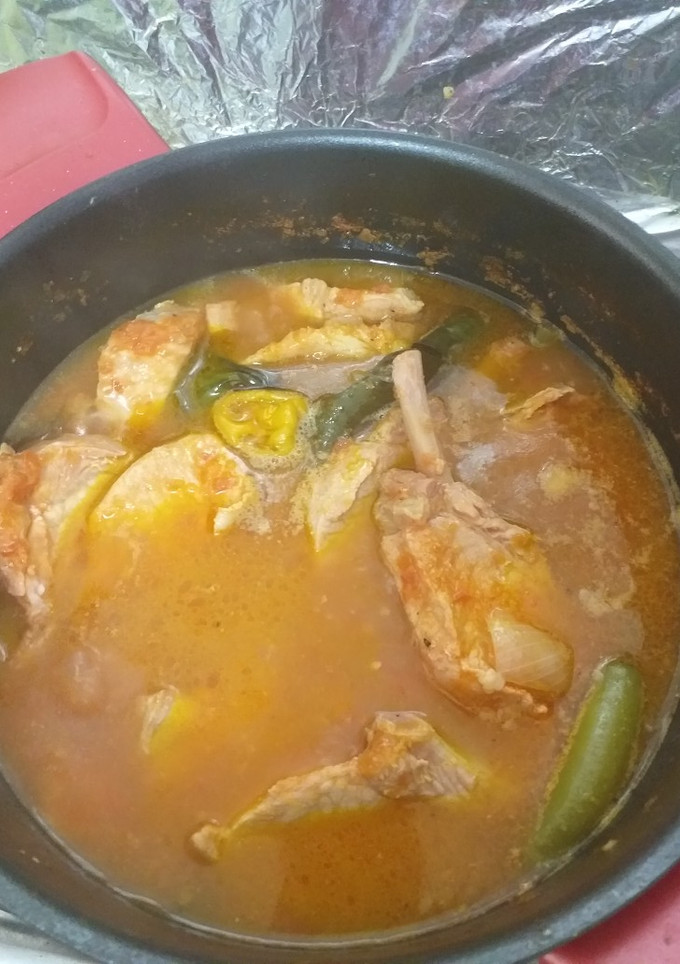 Una foto de Chuleta con hueso en salsa roja