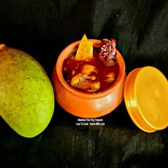 A picture of Methambo - Raw Mango Sweet & Sour Instant Pickle - Vaghariyu Gujarati Style.