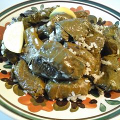 A picture of Dolmadakia Stuffed Grape/Vine Leaves.