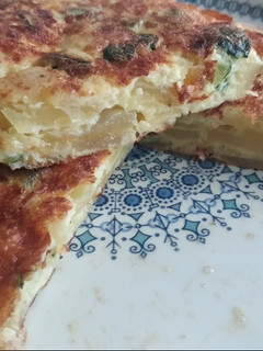 Una foto de Tortilla española tres tercios