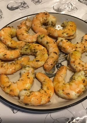 Une photo de Crevettes sauvages marinées épices,agrumes et origan