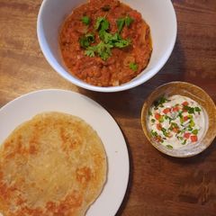 A picture of Lentil and tomato curry, Indian style.