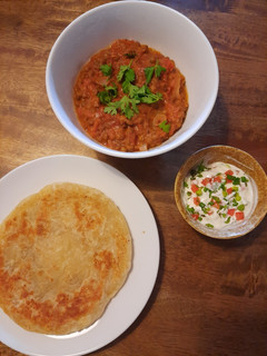 A picture of Lentil and tomato curry, Indian style.