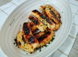 Foto principal de Pota laqueada con limón y salsa hoisin