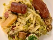 A picture of sauteed cabbage and sausage