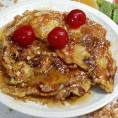 Una foto de Tortitas con almendras crocanti y miel
