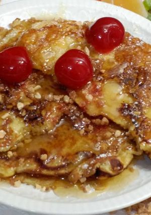 Una foto de Tortitas con almendras crocanti y miel