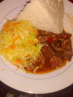 A picture of Beef Stew, Cabbage and Ugali.