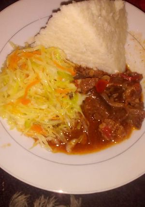 A picture of Beef Stew, Cabbage and Ugali.