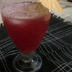 A picture of Pomegranate mocktail Red riding hood.