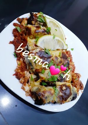 صورة لوصفة باذنجان محشي بصلصة الطماطم والبشاميل