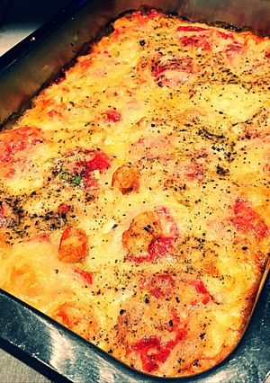 Una foto de Sorrentinos al horno con salsa de Langostinos gratinado