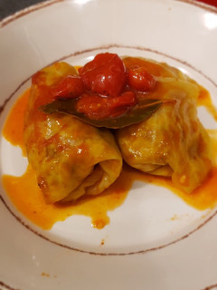 A picture of Niños envueltos (stuffed cabbage rolls).