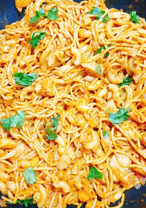 A picture of Leftover macaroni spaghetti in tomato creamy sauce.