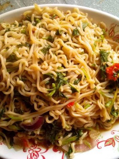 A picture of Noodles with viggies.