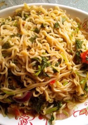 A picture of Noodles with viggies.